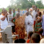 THE ASSEMBLY MAN TESTING THE WATER FROM THE BOREHOLE